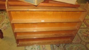 A 20th century pine wall hanging kitchen rack, 107 x 80 cm.