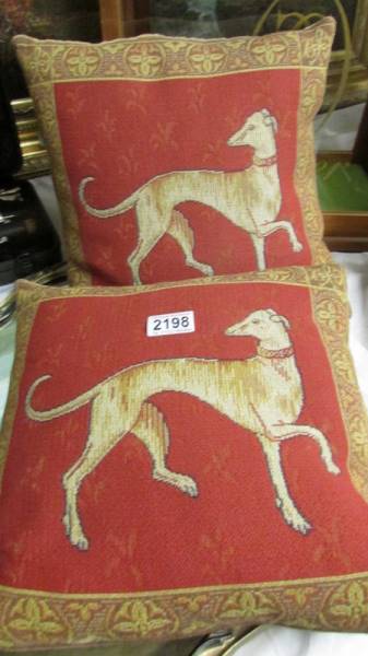 A pair of good quality cushions featuring dogs.