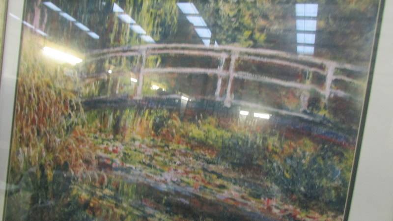 A framed and glazed vibrant print of Monet's 'Bridge at Giverny' (88 x 78 cm). - Image 2 of 2