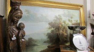 A large gilt framed oil on canvas rural scene.