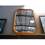 A pine framed mirror,