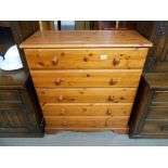 A modern solid pine 5 drawer bedroom chest, Height 94cm, width 87cm approx.