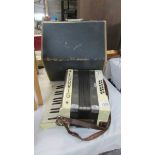 A cased Ludwig 'The Antoria' accordion.