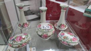 A six piece floral dressing table set.