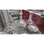 A six piece floral dressing table set.