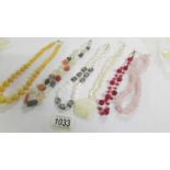 6 assorted stone necklaces in various colours.