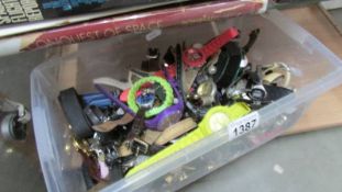 A large box of mixed wristwatches.