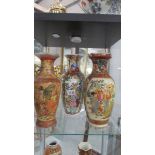 Three large Chinese vases.