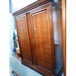 A large darkwood stained 2 door wardrobe with adjustable shelves, height 212cm, width 170cm,