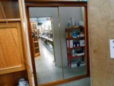 A large teak effect wardrobe with 2 mirrored doors and adjustable shelves, height 216cm,