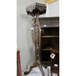 A Victorian mahogany plant stand.