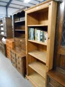 A solid pine 5 shelf book case, Height 183.5cm, width 77cm approx.