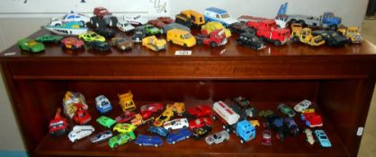 2 shelves of mixed diecast including Corgi, Matchbox, Hot Wheels etc.