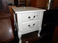 A white finished 2 drawer bedside chest of drawers, height 56cm, width 45.5cm approx.
