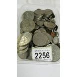 A large quantity of UK coins including crowns.