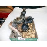 A pair of gilded resin cherub candlesticks, trinket box, marble lion, white metal items,