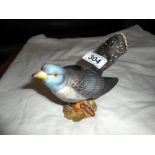 A Beswick Cuckoo, model 2315, brown and grey with gloss finish, restoration to beak,