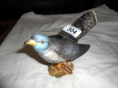 A Beswick Cuckoo, model 2315, brown and grey with gloss finish, restoration to beak,