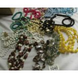 Approximately 15 bead necklaces.