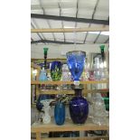 A large mixed lot of art glass including vases, Toby Jug etc.