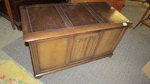 An oak and ply blanket box.