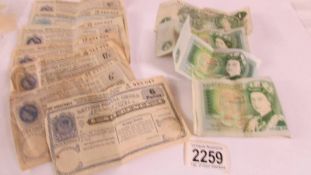 Four old £1 notes and some postal orders,.