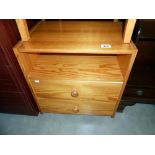 A solid pine 2 drawer bedside unit, height 55.5cm, width 50cm approx.