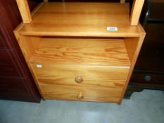 A solid pine 2 drawer bedside unit, height 55.5cm, width 50cm approx.