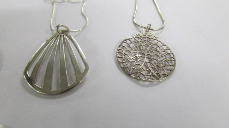 4 assorted silver pendants. - Image 2 of 3