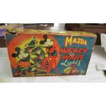A boxed set of vintage Mazda Mickey Mouse lights.