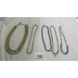 Five diamonte'/crystal necklaces.