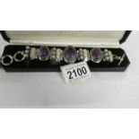 A pretty amethyst, mother of pearl and round pearl bracelet in heavy silver, stamped.
