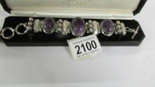 A pretty amethyst, mother of pearl and round pearl bracelet in heavy silver, stamped.