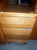 An oak effect office 2 drawer filing chest, Height 53cm, width 40cm, depth 52cm approx.