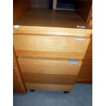 An oak effect office 2 drawer filing chest, Height 53cm, width 40cm, depth 52cm approx.