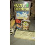 A boxed vintage Acorn Electron home computer.
