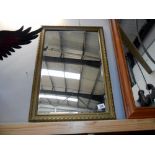 A wooden framed mirror, slight a/f to frame size 67.