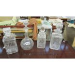 Four cut glass decanters.