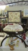 A 19th century hall chair with new upholstery