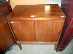 A retro record/music cabinet, missing 1 handle, height 72cm, width 61cm approx.