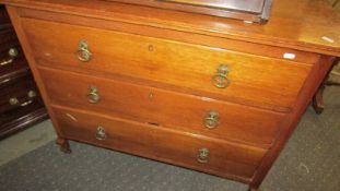 An oak 3 drawer chest.