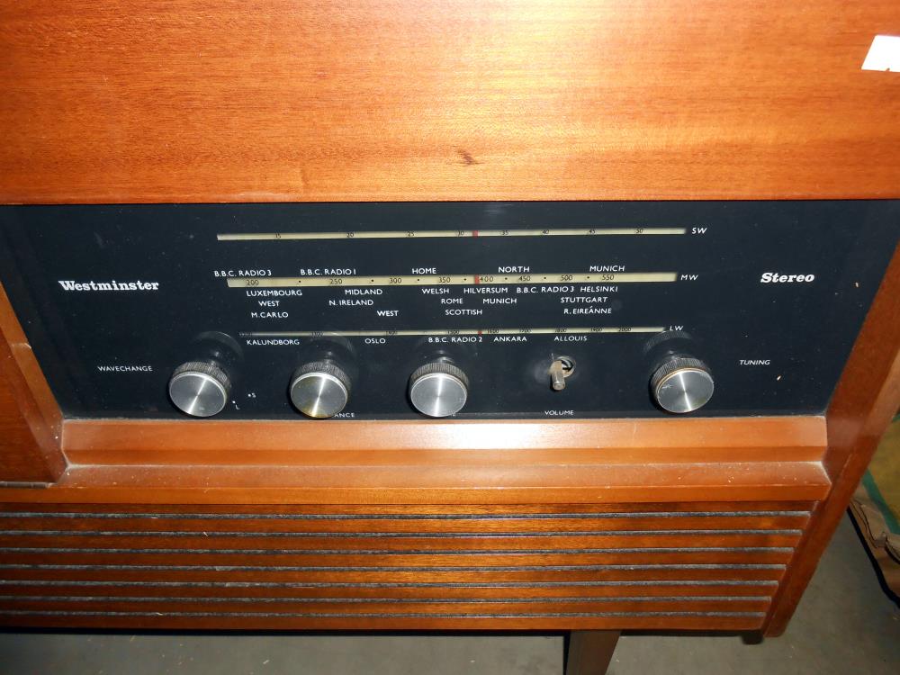 A retro teak effect Westminster record player radio radiogramme, height 66cm, length 117cm approx. - Image 3 of 3