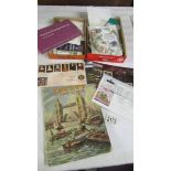 A mixed lot of stamps, loose and in album and a quantity of first day covers.