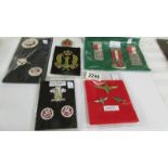 5 small boards including 3 replica clan badges.