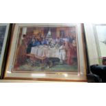 A framed and glazed print of a family at afternoon tea.