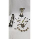 A mixed lot of hall marked silver including trophy, bottle top, spoons, bracelet, sugar nips etc.