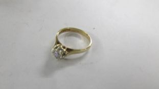 A diamond single stone ring dated Sheffield 1994, hall marked 9ct. Size K.