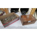 An inlaid box (no key and in dirty condition) and a box of very dirty coins.