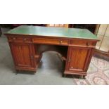 A Gillow of Lancaster knee hole desk. ****Condition report**** Width 128cm.