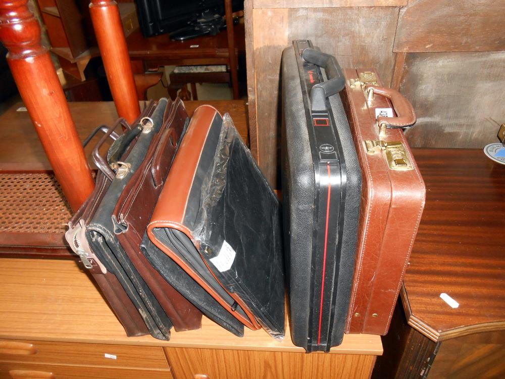 A quantity of briefcases/attache/document cases etc,